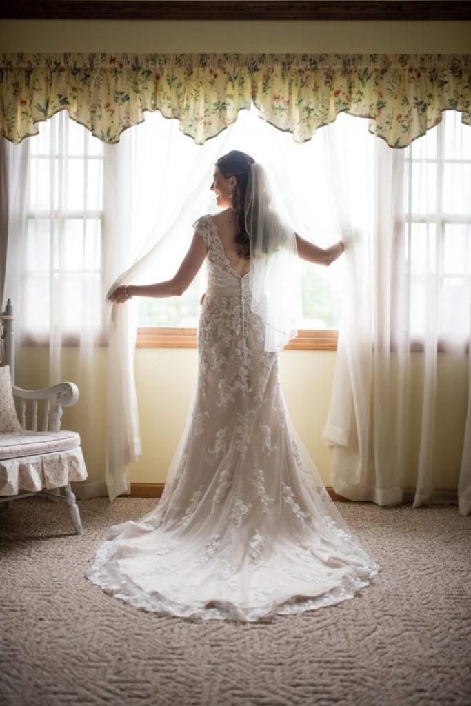 ivory lace wedding dress from Justin Alexander for a vintage wedding