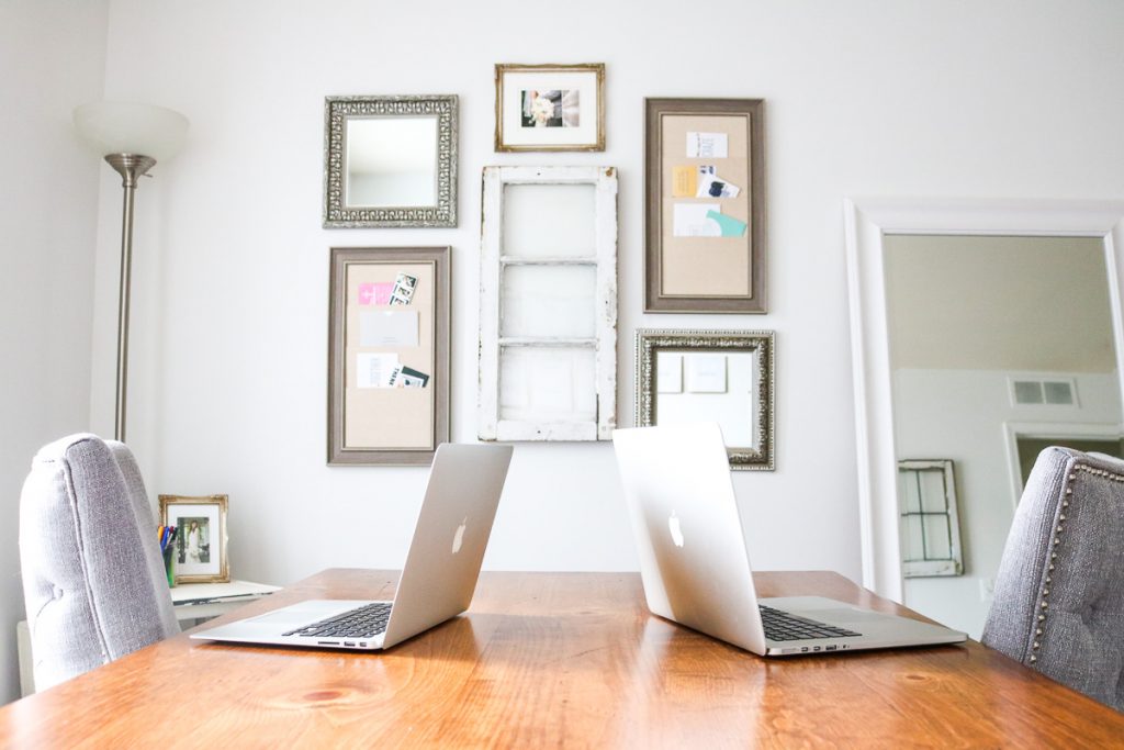 Work table, wall decor and mirror in vintage home office
