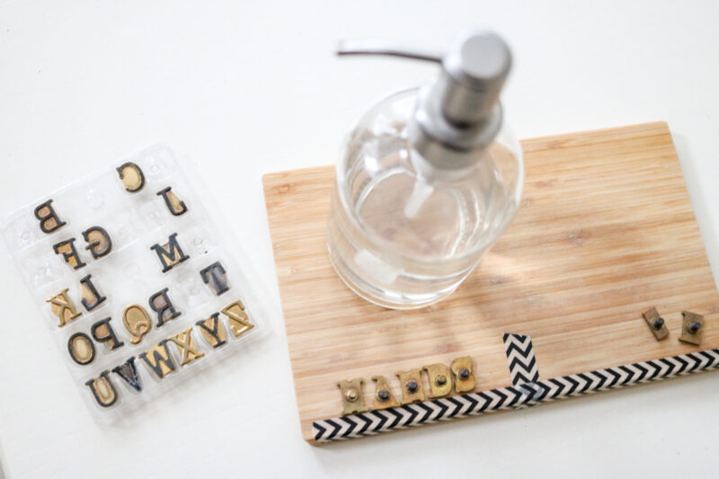 using washi tape as a spacing guide for DIY woodburned hand soap dispenser tray