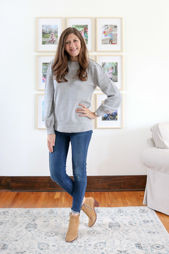 Women's Soft Touch Pleated Shoulder Crewneck Sweater in gray with jeans and brown suede booties